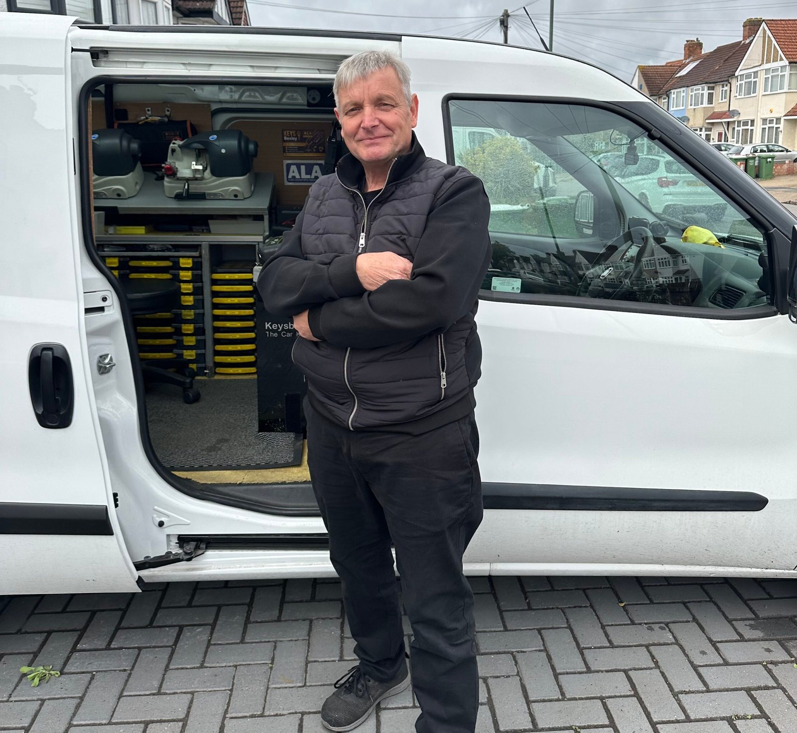 Terry from Keys Bexley beside his mobile auto locksmith van